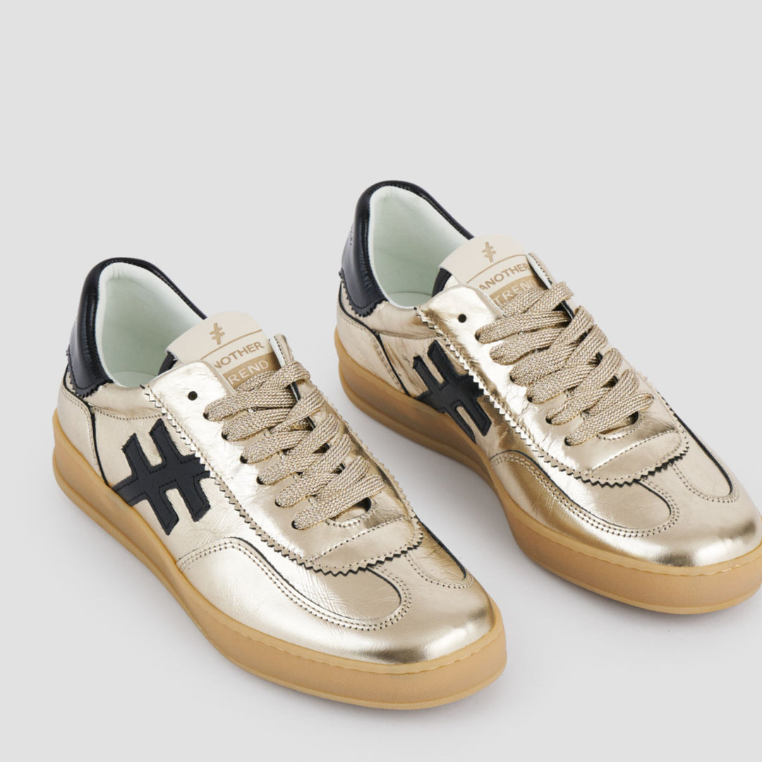 Another Trend KOPA Gold Metallic & Black Trainers